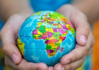 child holding globe